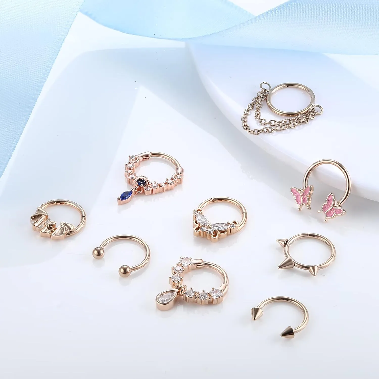 Sanfenly 9Pcs 16G Septum Rings for Women Men Stainless Steel Dangle Septum Jewelry Blue Planet Teardrop CZ Butterfly Bat Spiked Daith Earrings Hoop Nose Rings Cartilage Helix Septum Piercing Jewelry